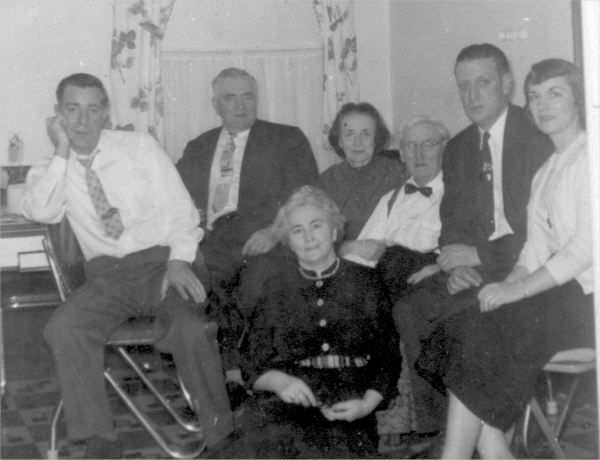 519: Three generations of McCarthy's. Left-to-right in back Denis, Tom, Julia, Denis Patrick, John,  and Teresa, with Mary in front. Tom, Julia &amp;amp; Mary are Denis Patrick and his wife Sarah Wither's  children; Denis, John and Teresa are his grandchildren - Thomas and his wife Elizabeth Carroll's children.